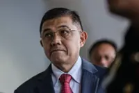 Former armed forces chief vows to clear his name after corruption charges