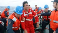 Chinese coast guard rescues Philippine sailors in disputed waters, two found dead (update)