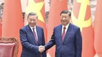 China's Xi lauds 'shared future' with Vietnam after To Lam's re-election