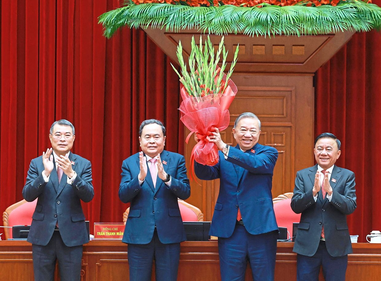 To Lam wins second term in charge