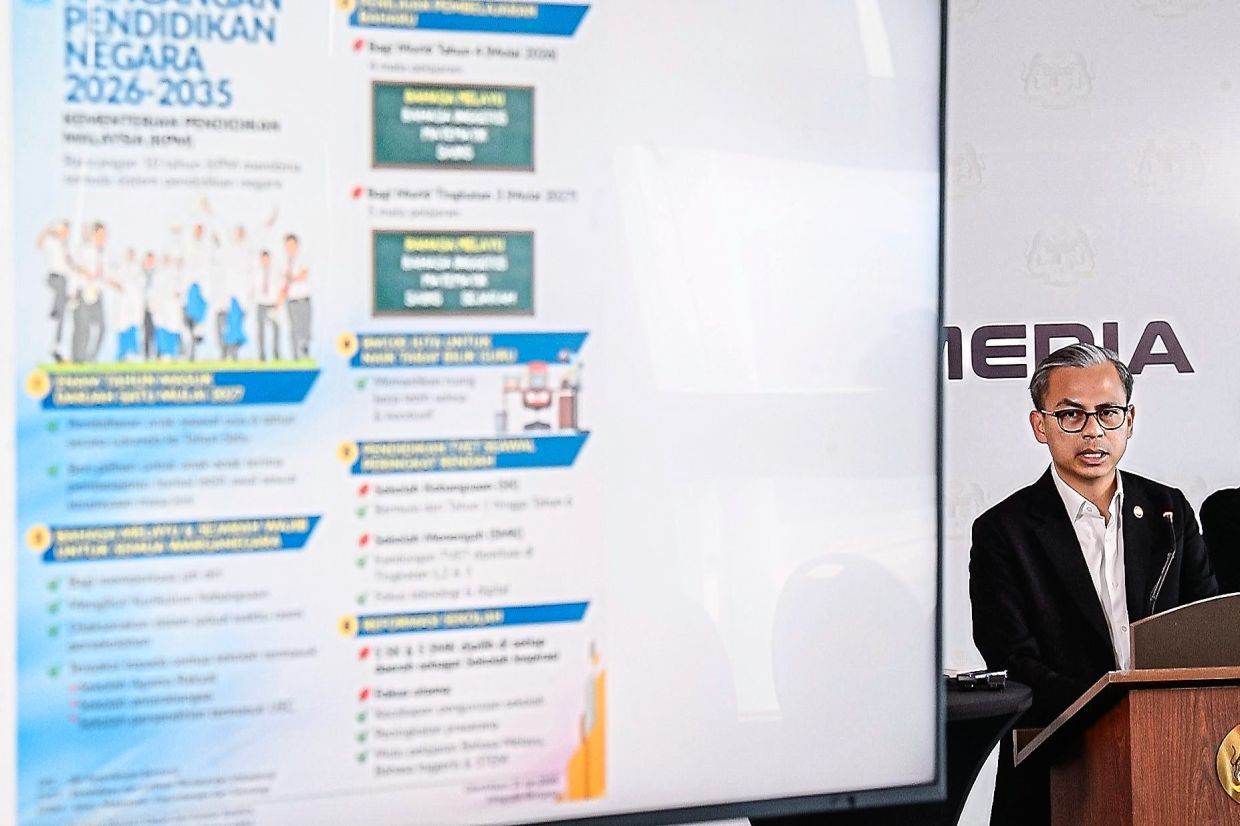 Enhancing the law: Fahmi speaking at a press conference in Putrajaya. — Bernama