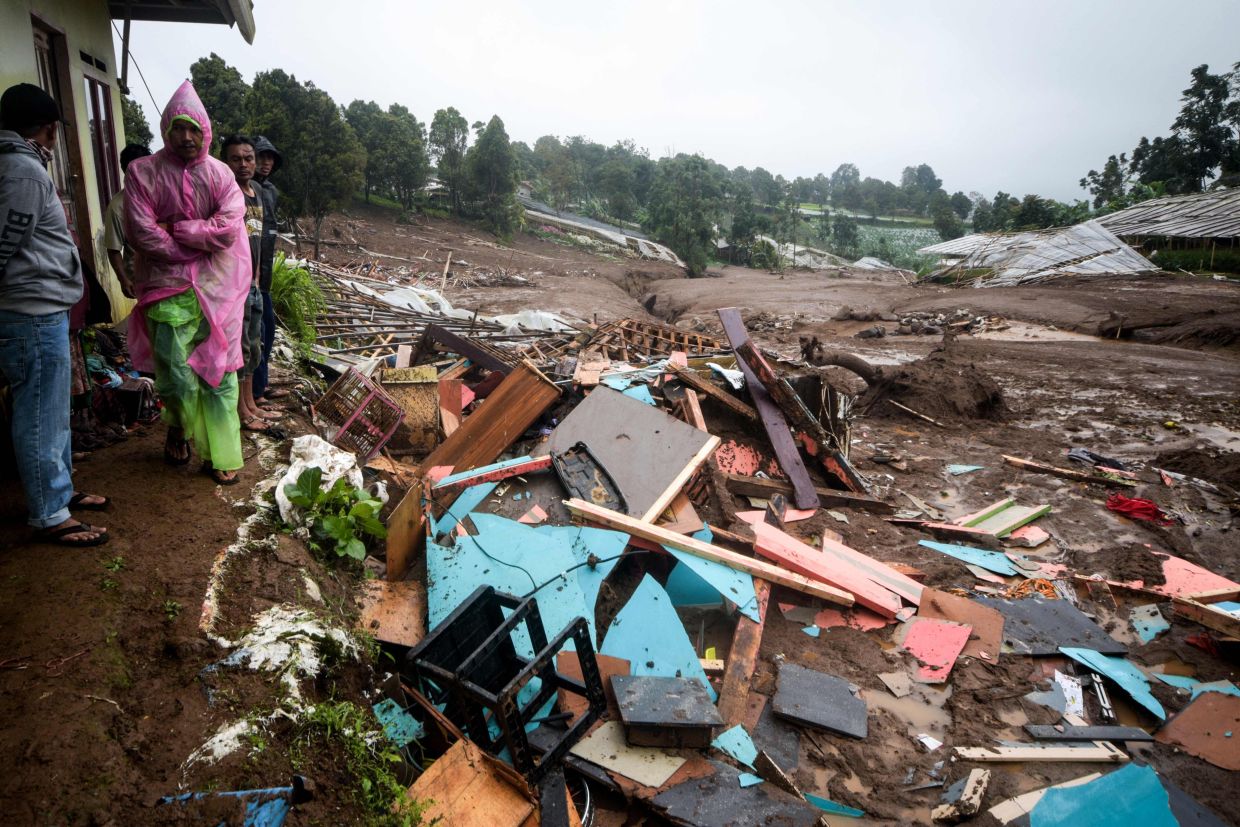 Death toll rising - Eight people now confirmed dead and another 82 are feared missing in West Bandung landslide