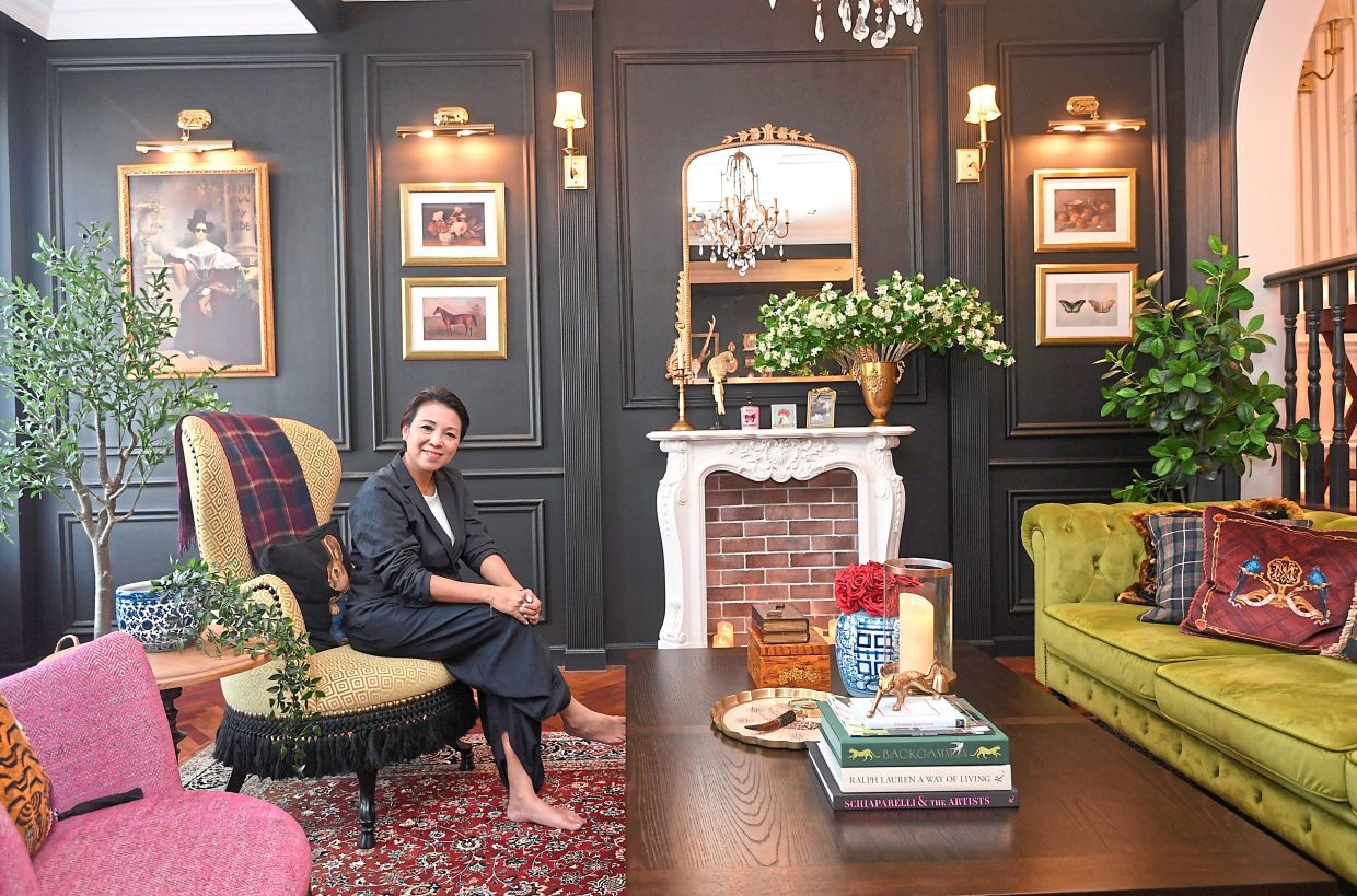For Cheong, maximalist design means setting a strong colour palette, defining feature walls, then layering characterful furniture and decor.