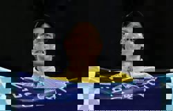 Tennis-Survivor Sinner battles cramp, heat to reach fourth round