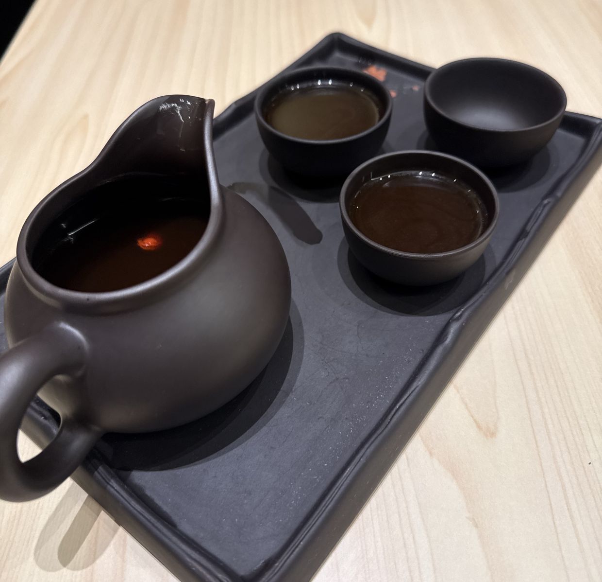 Warm Your Heart and Stomach is brewed with bak kut teh broth, baijiu and glutinous rice wine. — Photo: MICHAEL CHEANG/The Star
