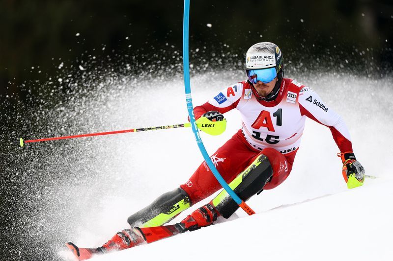 Alpine skiing-Feller a winner on home snow in Kitzbuehel slalom