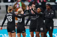 Soccer-Man City go nine points clear in WSL after 2-1 win over London City
