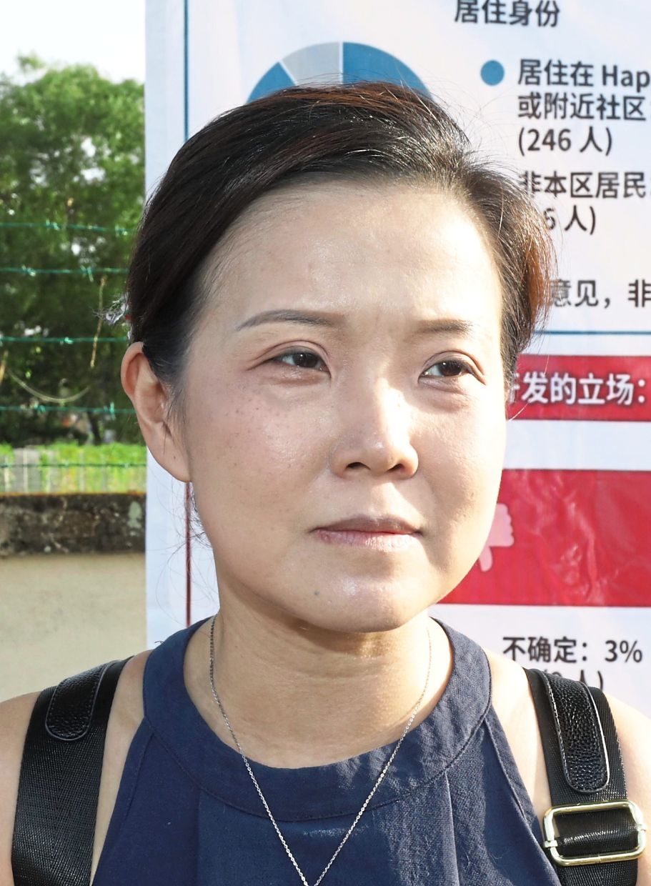 Chin says a woman claiming to represent a company had visited several residents and informed them of the plan for the complex.