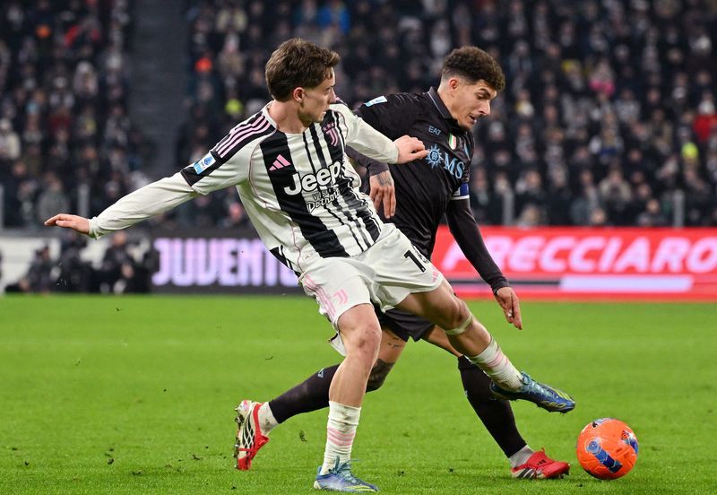 Soccer-Juventus earn commanding win over injury-hit Napoli to close in on top four