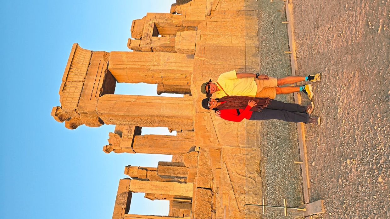 The writer with his wife in Perse­­polis, Iran.