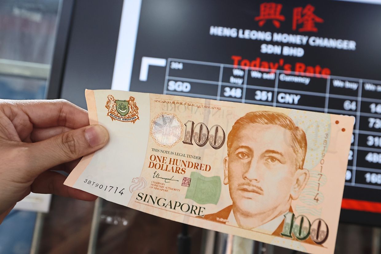 Singapore dollar hits highest in over 11 years versus greenback