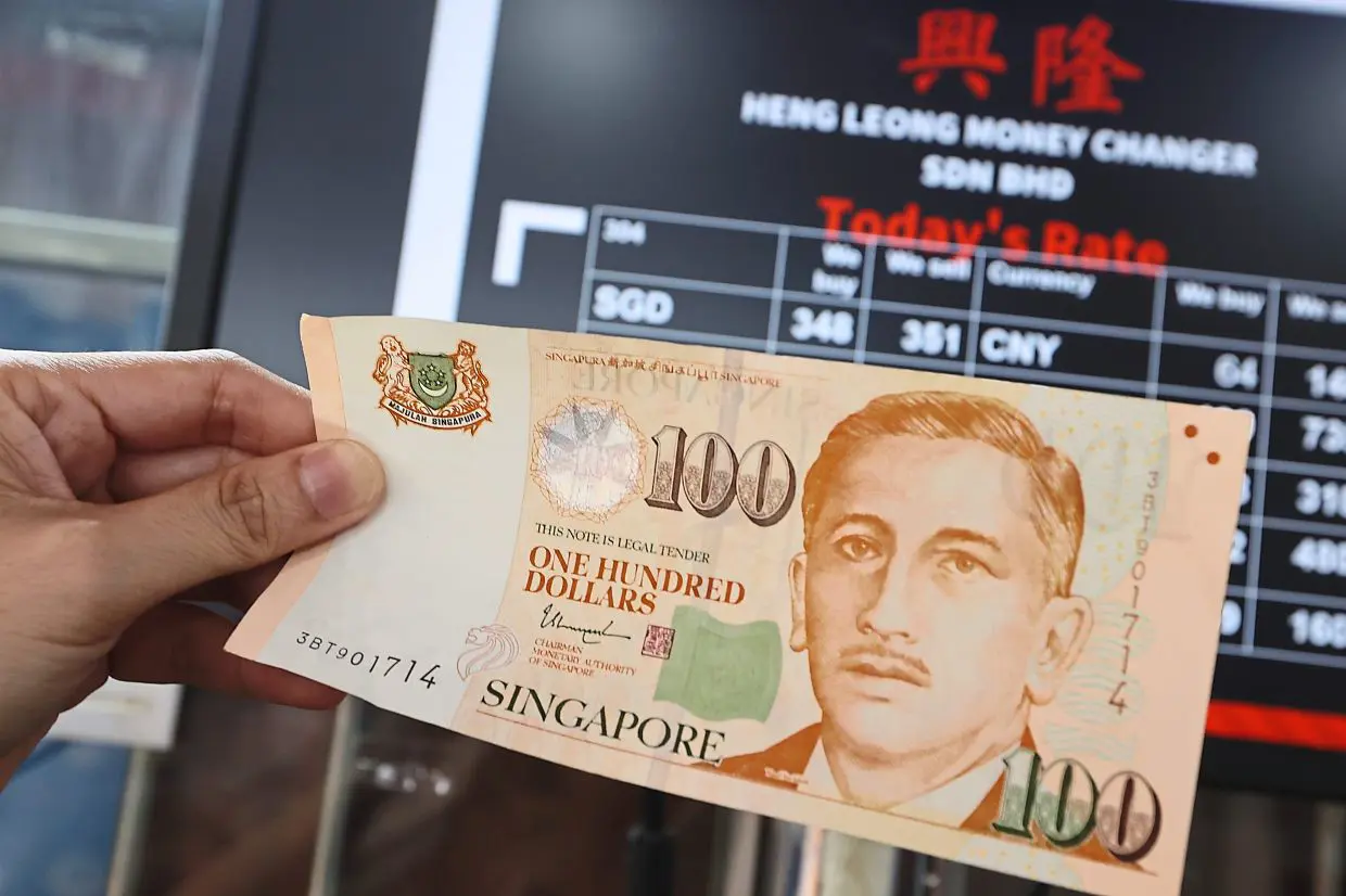 Singapore dollar hits highest in over 11 years versus greenback | The Star