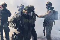 Explainer-Can ICE agents be prosecuted for Minneapolis shootings?