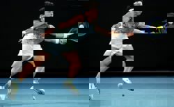 Tennis-Djokovic stand-in Shelton overhauls Ruud to reach quarter-finals