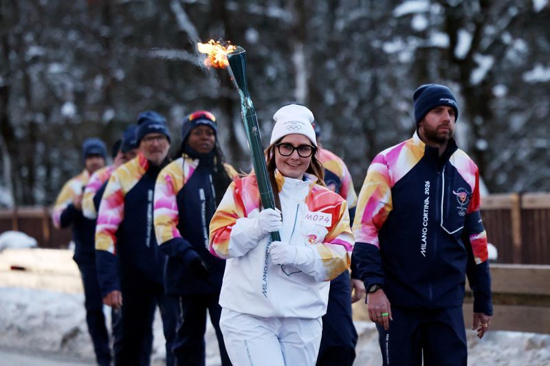 Olympics-Torch arrives in co-host Cortina on anniversary of 1956 Games