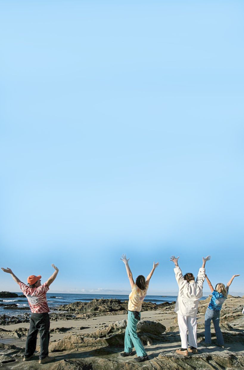 Class members participate in a laughter yoga class on Main Beach in Laguna Beach, Calif., Nov. 29, 2006.— AP Photo/Chris Carlson, File)