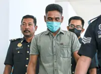 Cigarette toss lands worker in court