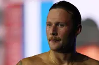 Swimming-Canada's Olympic swimmer Kharun switches allegiance to US