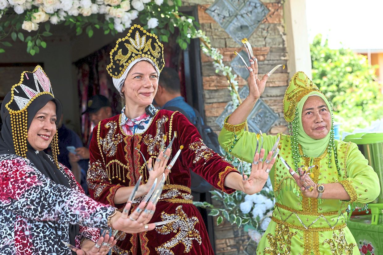 Adorned in the tradition, culture of Semporna Bajau