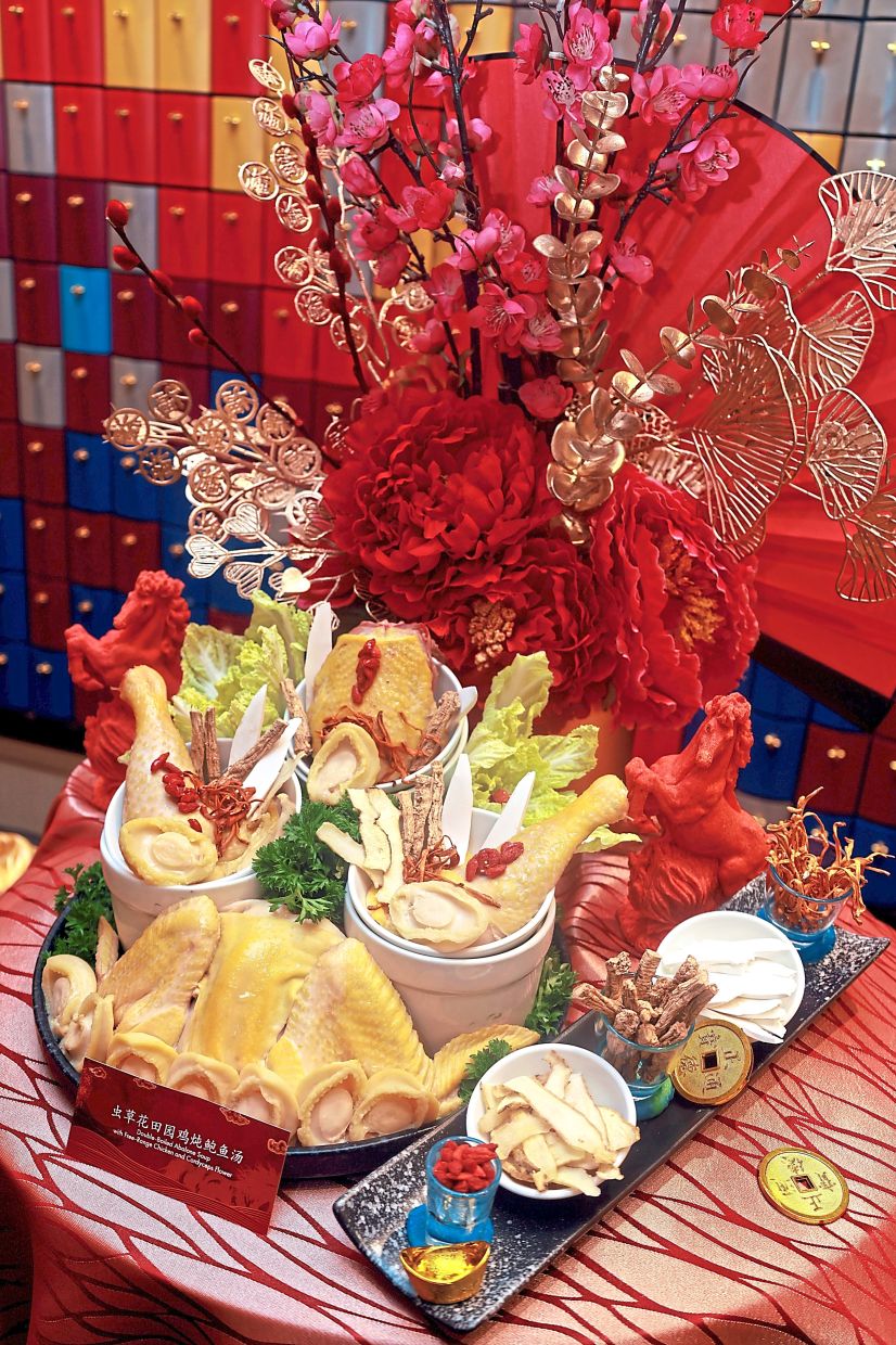 Double-Boiled Abalone Soup with Free Range Chicken and Cordyceps Flower.