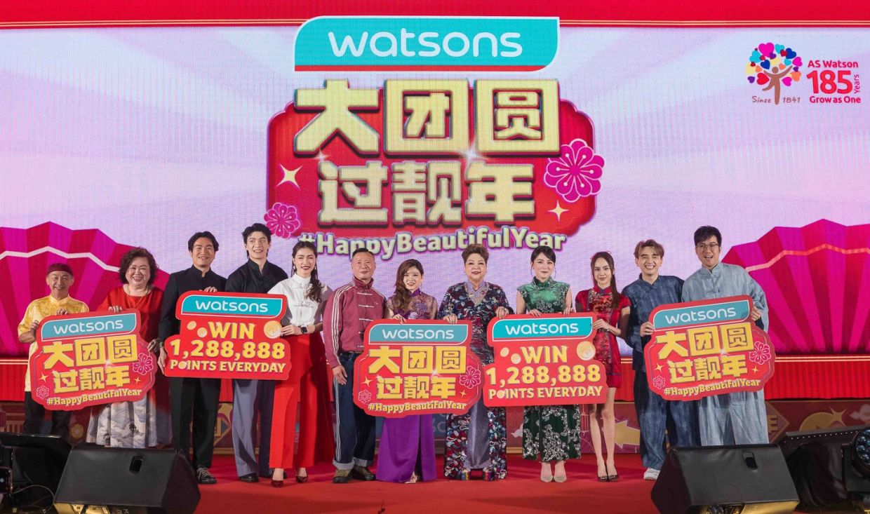 Loh (seventh from left) and Hoh (sixth from left) alongside the stars of Watson’s latest festive film.
