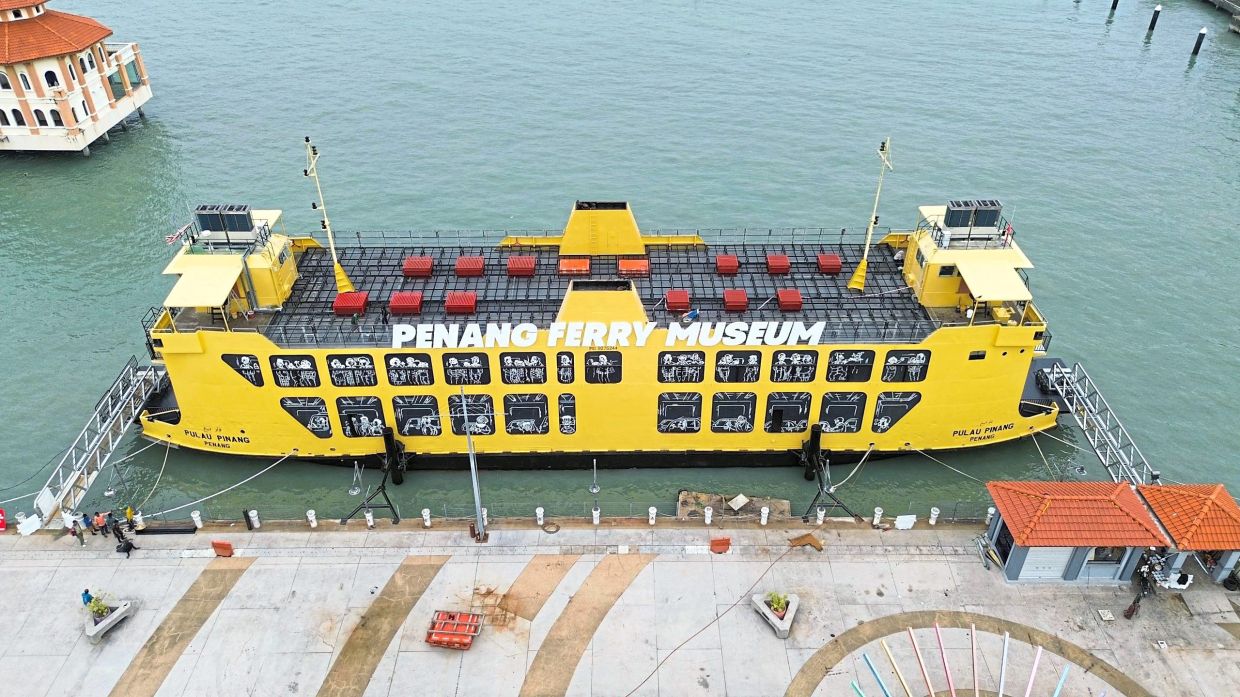 Visitors enter the museum on the main deck via a pierside gangway, then pass through a photo tunnel into the History Gallery, which chronicles the Penang port and ferry service. Photo: Penang Ferry Museum