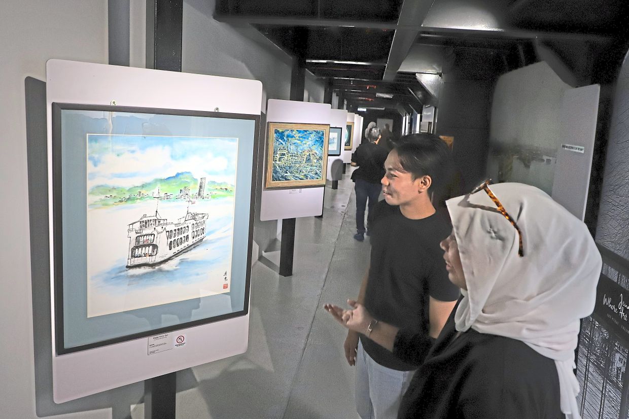 The museum’s art gallery showcases a range of ferry-themed artworks, with select pieces available for purchase. Photo: The Star/Lim Beng Tatt 