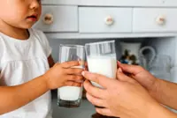 Is whole milk better than low fat milk for children's consumption?