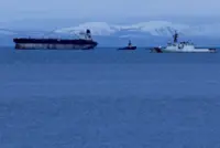 Captain of seized Venezuela-linked tanker now aboard U.S. vessel, wife's lawyer says