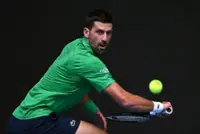 Tennis-Djokovic through to Australian Open semi-finals after Musetti injury