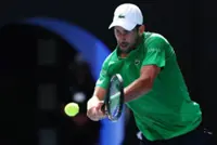 Tennis-Djokovic gets out of jail and into Melbourne semis as injured Musetti forced to retire