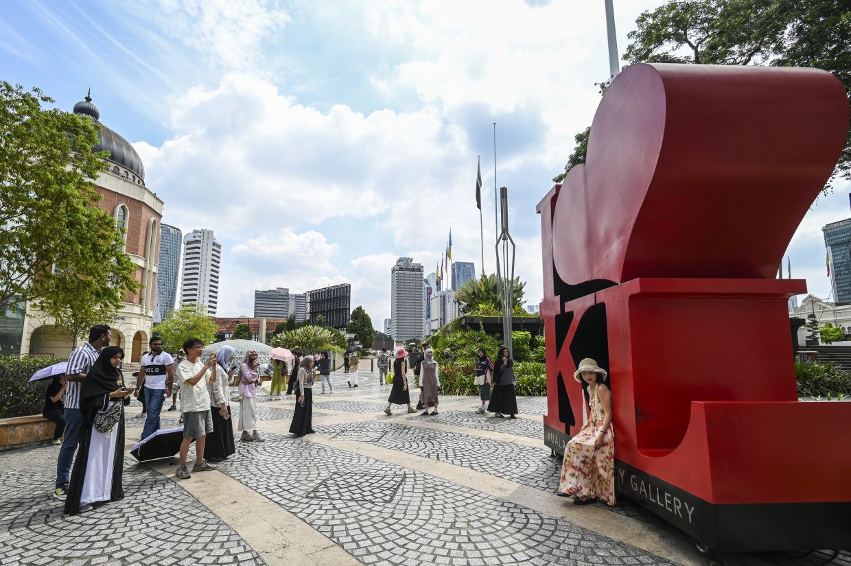 “I Love KL” near Dataran Merdeka is an iconic red thing to photograph. — IZZRAFIQ ALIAS/The Star