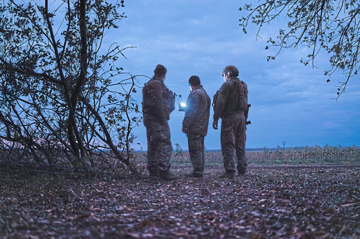 FILE — A Ukrainian artillery unit monitors for drones in the Dnipro region of Ukraine on Oct. 17, 2025. Shifts in tactics and technology in Ukraine mean that the pace of fighting is no longer decided by whether tanks can navigate frozen fields. (Tyler Hicks/The New York Times)