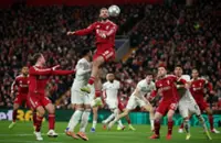 Soccer-Liverpool thrash Qarabag 6-0 to cruise through