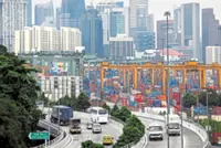 Singapore keeps monetary settings unchanged, flags firm growth