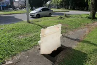 Woman injured after falling into open manhole in Sandakan