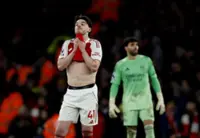 Soccer-Arsenal under pressure as Premier League title race heats up