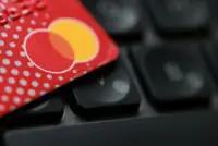 Mastercard profit exceeds expectations, set to lay off 4% globally