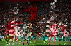 Soccer-Liverpool thrash Qarabag 6-0 to cruise through