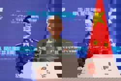 China warns US attempts to contain it 'doomed to fail'