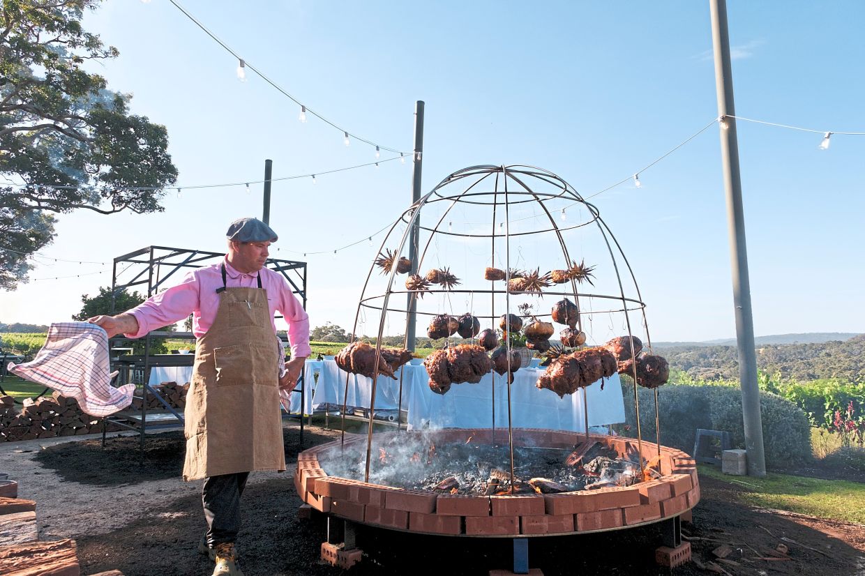 Dome cooking involves building a dome using wires, setting a fire around it and stringing up food to cook over the fire.