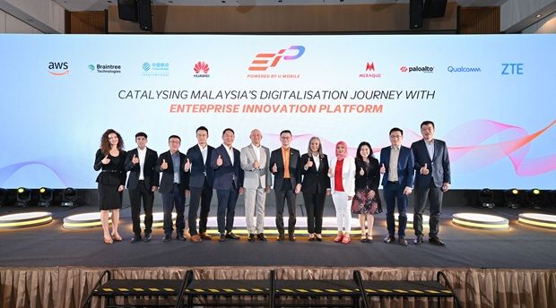 (From left) Amazon Web Services technology leader Olta Alushi, Braintree Technologies chief executive officer Arif Makhdzir, China Mobile International Malaysia managing director Fu Li, Huawei Malaysia deputy chief executive officer Zac Chow, Woon, U Mobile chief executive officer Wong Heang Tuck, its deputy chief executive officer Kenneth Chang, its Enterprise Innovation Platform head Junaida Abdullah, Meraque Group chief operating officer Suria Affandi, Palo Alto Networks country director Sarene Lee, Qualcomm Technologies technical marketing director (South-East Asia) Tee Kai Ping and ZTE Malaysia managing director Steven Ge in a group photo during the event in Kuala Lumpur.