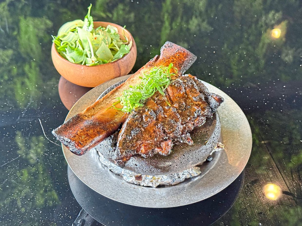 Cooked sous vide for 72 hours then finished off on a grill, the Angus short ribs are sublime from start to finish. — MICHAEL CHEANG/The Star