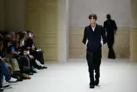 Paris swings between baggy excess and razor-sharp tailoring on menswear runways