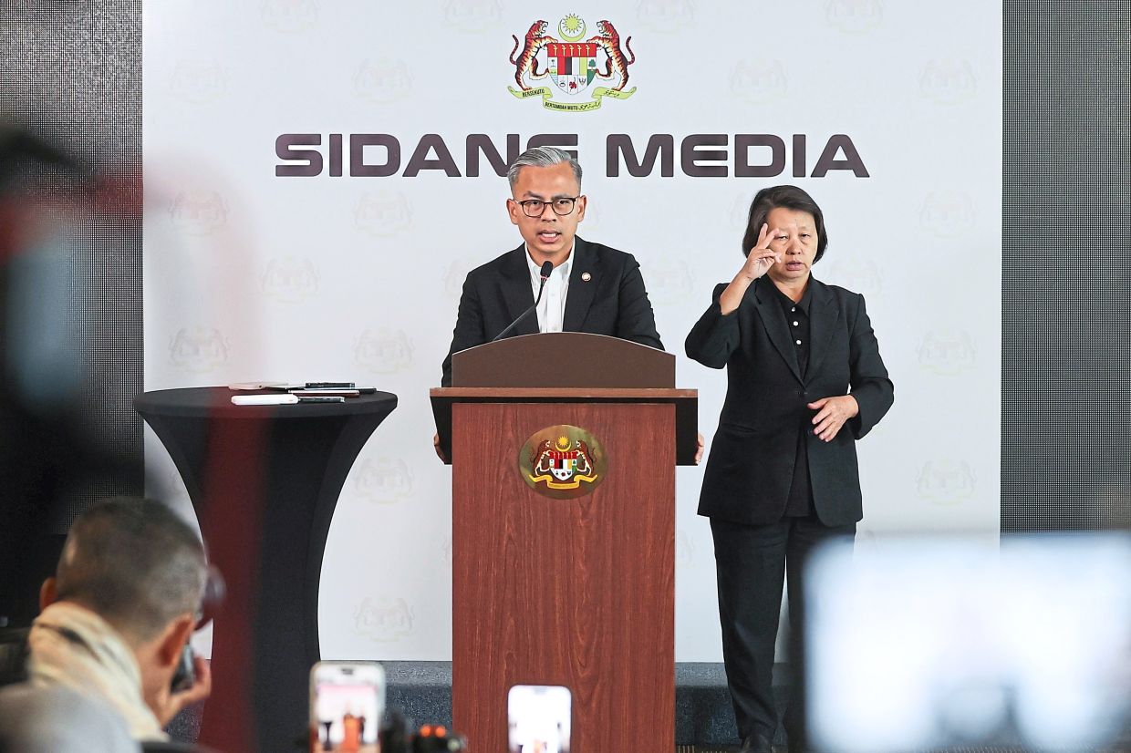 Press briefing: Fahmi speaking to reporters about the number of foreign visitors who have been caught abusing their social visit passes. — Bernama