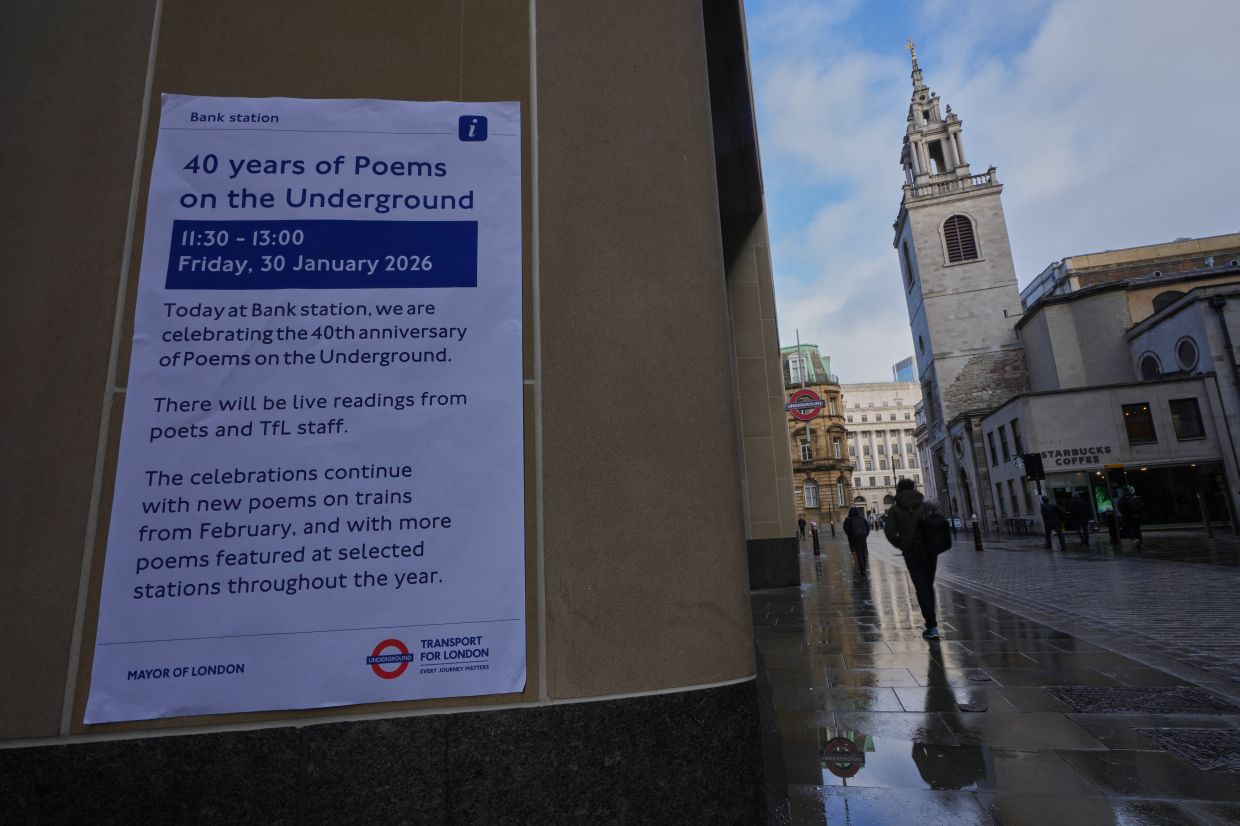 A poster advertising a gathering to celebrate 40 years of 'Poems on the Underground' in London. Photo: AP
