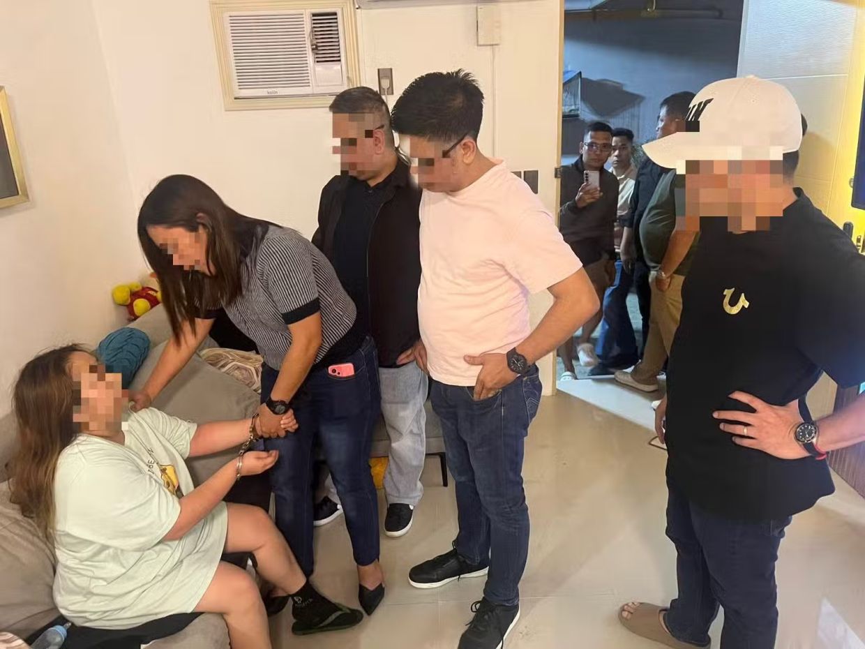 Three arrested over killing of Philippine policewoman and eight-year-old son