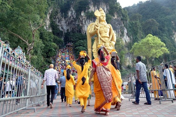 Batu Caves draws sea of yellow-clad devotees for Thaipusam