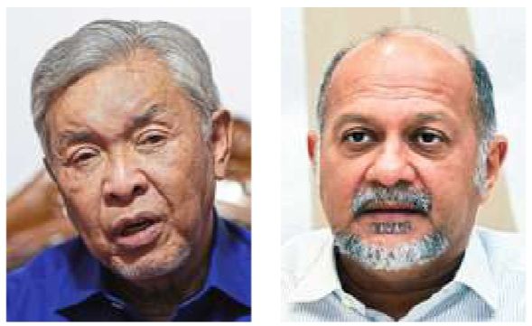Sharing their wishes: Ahmad Zahid (left) and Gobind.