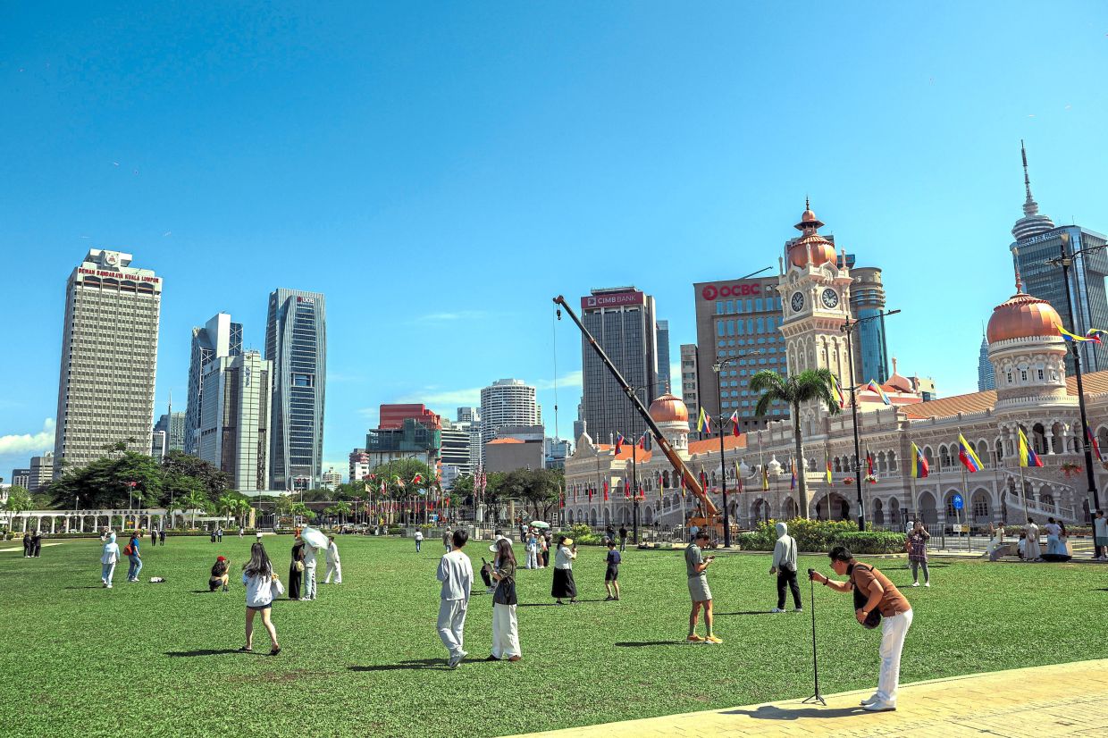 Tan Sri George recalls how BSAS’s identity was shaped by its surroundings - facing the Padang and framed by the Selangor Club, St Mary’s Church and the former Chartered Bank. Photo: Bernama 